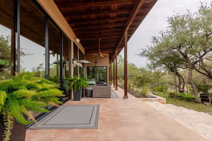 La Paz long covered patio walkway with view onto the property